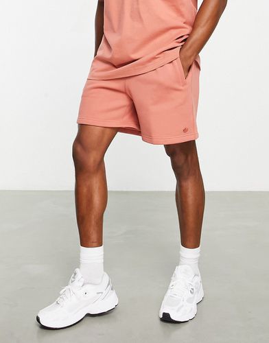 Contempo - Pantaloncini arancioni con logo a trifoglio - adidas Originals - Modalova