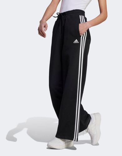 Adidas Essentials - Joggers ampi in French Terry neri con 3 strisce - adidas performance - Modalova