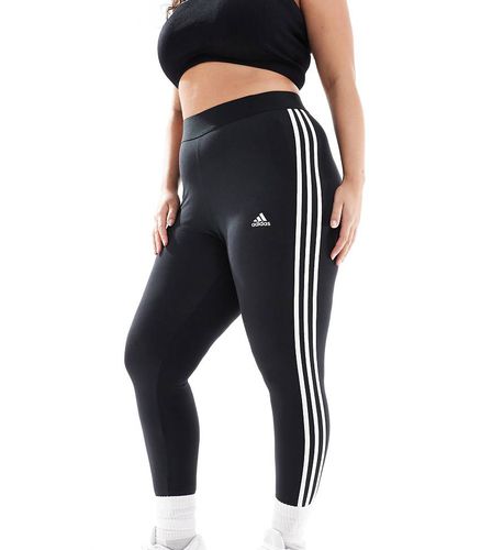 Adidas Plus - Sportswear Essential - Leggings neri con 3 strisce - adidas performance - Modalova