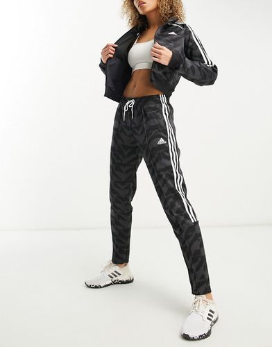 Adidas - Sportswear Tiro - Joggers neri e multicolore - adidas performance - Modalova