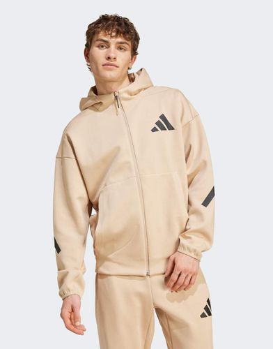 Adidas - Z.N.E. - Giacca sportiva premium beige con cappuccio e zip - adidas performance - Modalova