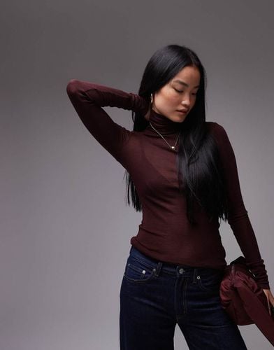 Dolcevita in maglia di lana merino bordeaux a coste semitrasparente - Arket - Modalova