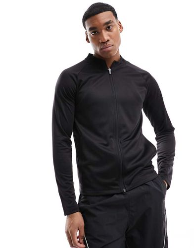 Giacca slim sportiva da allenamento a maniche lunghe con zip nera - ASOS - Modalova