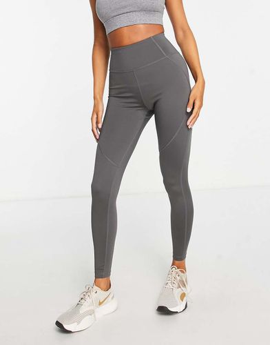 Leggings iconici con cuciture che scolpiscono i glugei e tasca - ASOS - Modalova