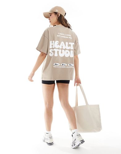 T-shirt pesante oversize color caffellatte con stampa "Health" sul retro - ASOS - Modalova