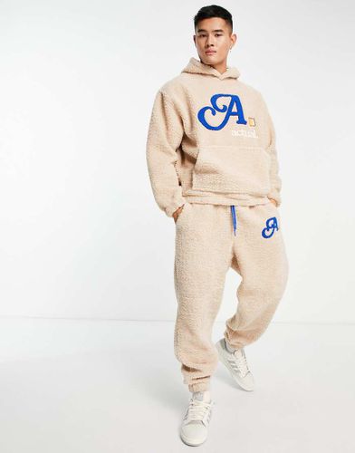 ASOS Actual - Joggers comodi in pile borg crema con logo in bouclé in coordinato - ASOS DESIGN - Modalova