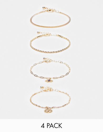 Confezione da 4 bracciali dorati con ciondoli a forma di occhio e serpente - ASOS DESIGN - Modalova