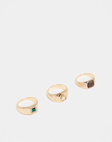 Confezione da 3 anelli con sigillo dorati con pietre sintetiche occhio di tigre - ASOS DESIGN - Modalova