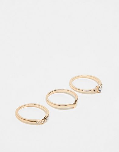 Confezione da 3 anelli dorati con zirconia cubica - ASOS DESIGN - Modalova