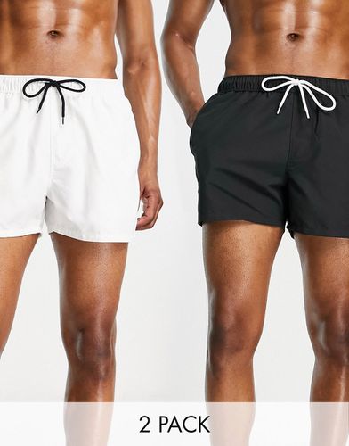 Confezione risparmio da 2 pantaloncini da bagno corti neri e bianchi - ASOS DESIGN - Modalova