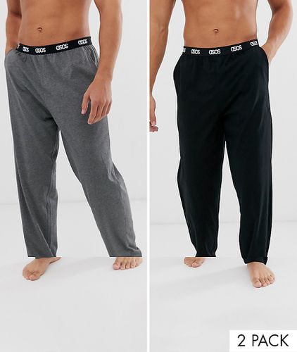 Confezione risparmio da 2 pantaloni pigiama nero e antracite mélange con elastico con logo in vita - ASOS DESIGN - Modalova