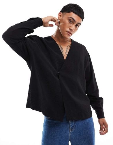 Camicia oversize squadrata a portafoglio nera stropicciata - ASOS DESIGN - Modalova