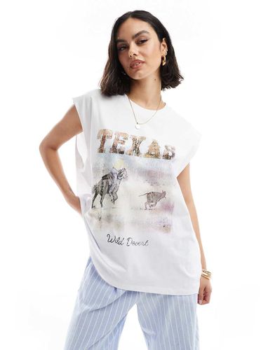 Canotta oversize bianca con grafica "Texas" e di cowboy - ASOS DESIGN - Modalova