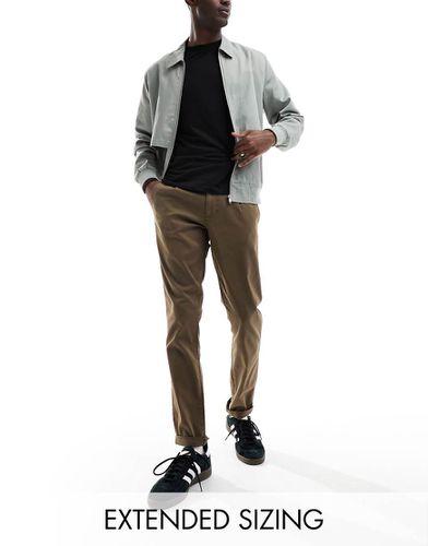 Chino slim kaki slavato - ASOS DESIGN - Modalova