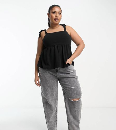 ASOS DESIGN Curve - Top estivo nero con fondo peplo e spalline annodate - ASOS Curve - Modalova