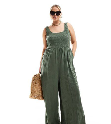 ASOS DESIGN Curve - Tuta jumpsuit a fondo ampio con scollo rotondo kaki - ASOS Curve - Modalova