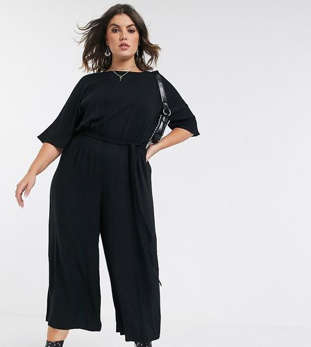 ASOS DESIGN Curve - Tuta jumpsuit allacciata in vita - ASOS Curve - Modalova