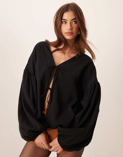 Blusa allacciata sul davanti nera - ASOS DESIGN - Modalova