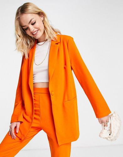 Blazer da abito extra largo in jersey arancione - ASOS DESIGN - Modalova