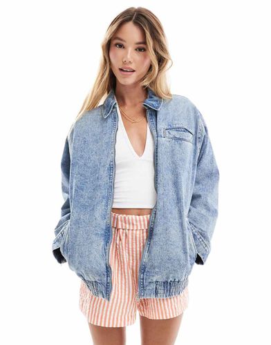 Giacca bomber di jeans lavaggio medio - ASOS DESIGN - Modalova