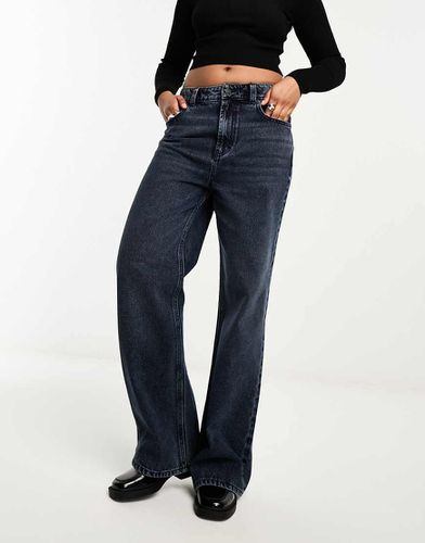 Dad jeans nero con fondo ampio - ASOS DESIGN - Modalova