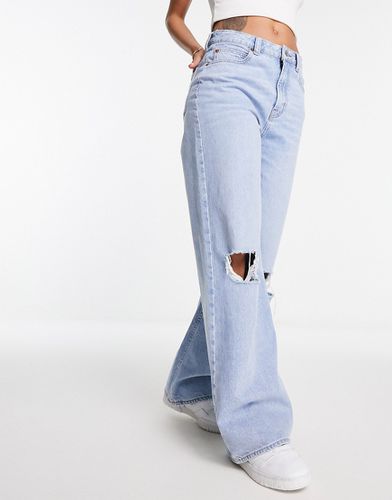 Dad jeans azzurri con strappi - ASOS DESIGN - Modalova