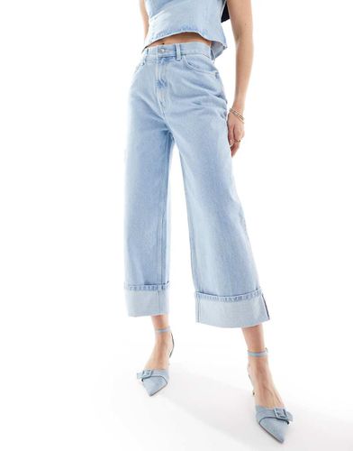 Dad jeans candeggiato con risvolto - ASOS DESIGN - Modalova