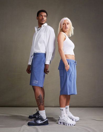 Disney - Pantaloncini unisex oversize testurizzati slavato con stampa di Topolino in coordinato - ASOS DESIGN - Modalova