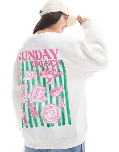 Felpa color latte di cocco con grafica "Sunday Brunch" - ASOS DESIGN - Modalova