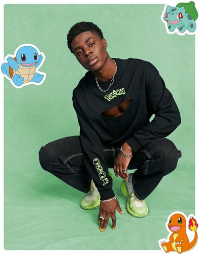 Felpa oversize nera con stampa Pokemon - ASOS DESIGN - Modalova