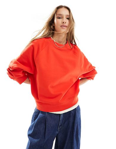 Felpa oversize rossa con dettagli raglan - ASOS DESIGN - Modalova