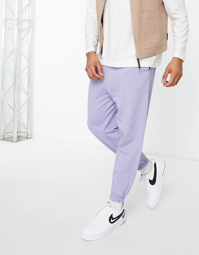 Joggers oversize lilla - ASOS DESIGN - Modalova