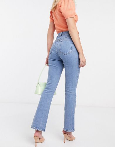 Jeans a zampa a vita alta anni '70 lavaggio chiaro vintage - ASOS DESIGN - Modalova