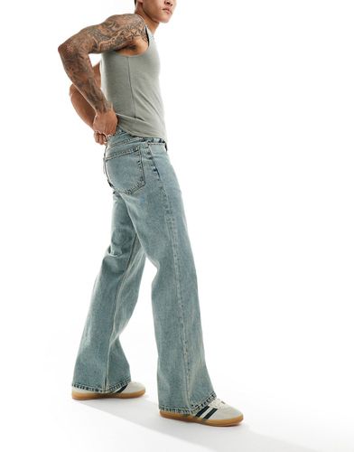 Jeans a zampa ampi azzurro tinto vintage - ASOS DESIGN - Modalova