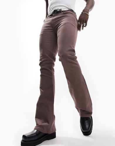 Jeans a zampa elasticizzato slavato - ASOS DESIGN - Modalova