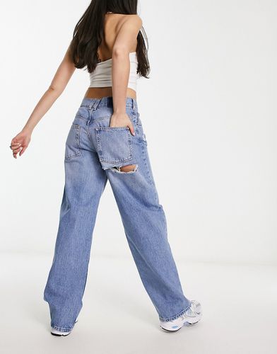 Jeans ampi stile boyfriend medio con strappi vistosi - ASOS DESIGN - Modalova