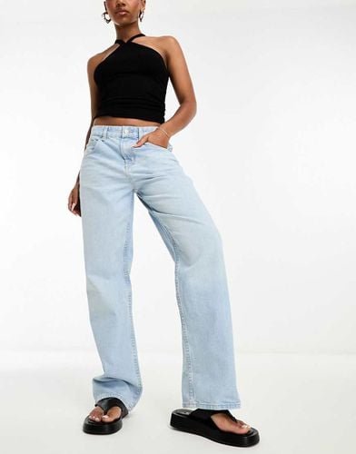 Jeans boyfriend ampi a vita medio alta chiaro - ASOS DESIGN - Modalova