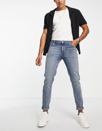 Jeans skinny lavaggio chiaro con sfumature - ASOS DESIGN - Modalova