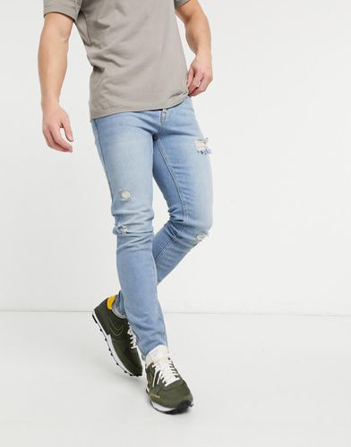 Jeans skinny lavaggio chiaro vintage con strappi - ASOS DESIGN - Modalova