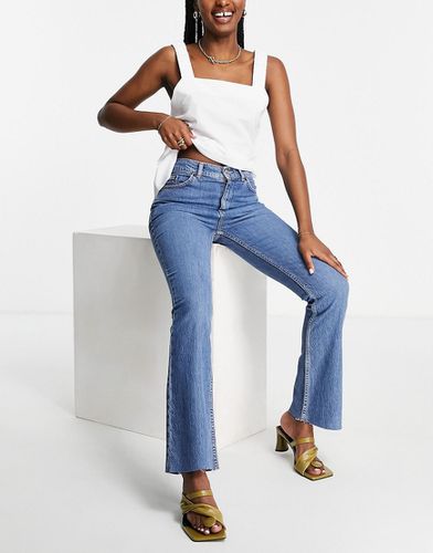 Jeans stretch a vita alta anni '70 a zampa lavaggio medio - ASOS DESIGN - Modalova