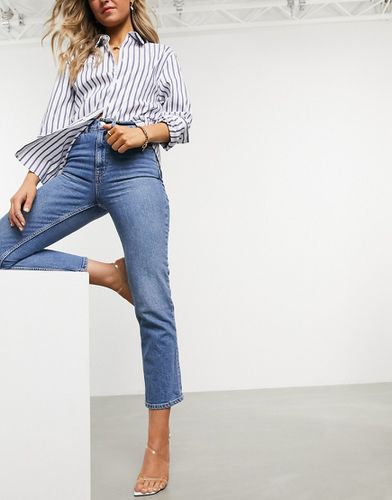 Jeans stretch slim dritti a vita alta lavaggio medio - ASOS DESIGN - Modalova