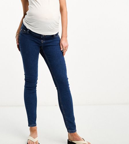 ASOS DESIGN Maternity - Jeans skinny medio con fascia sopra il pancione - ASOS Maternity - Modalova