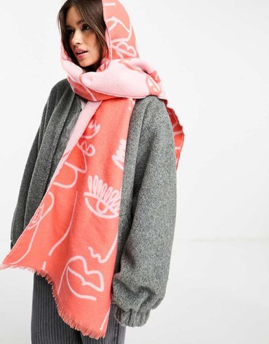 Sciarpa stile coperta rossa e rosa con stampa di volti jacquard - ASOS DESIGN - Modalova