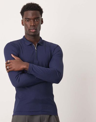 Polo attillata a maniche lunghe a coste - ASOS DESIGN - Modalova