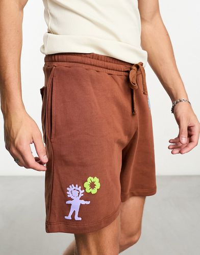 Pantaloncini oversize marroni con stampe - ASOS DESIGN - Modalova