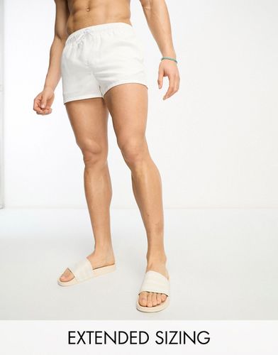 Pantaloncini da bagno bianchi taglio super corto - ASOS DESIGN - Modalova