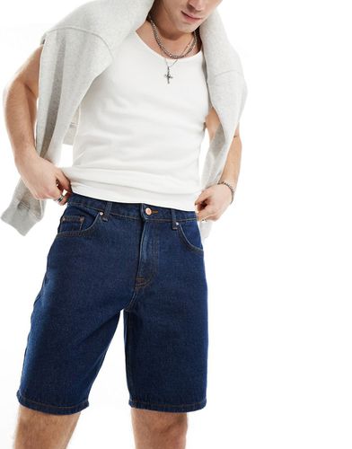 Pantaloncini di jeans taglio regular slim lavaggio indaco - ASOS DESIGN - Modalova