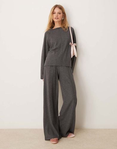 Pantaloni morbidissimi a vita bassa scuro mélange con cuciture a vista in coordinato - ASOS DESIGN - Modalova