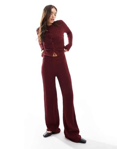 Pantaloni a fondo ampio a trecce bordeaux in coordinato - ASOS DESIGN - Modalova