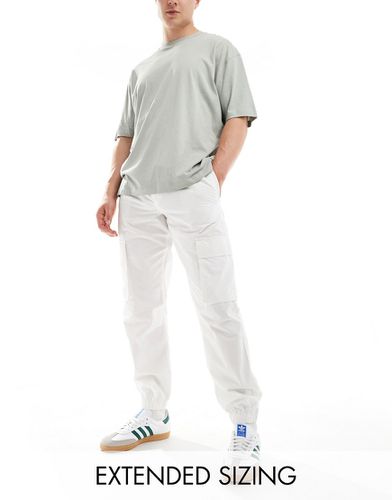 Pantaloni affusolati bianchi - ASOS DESIGN - Modalova